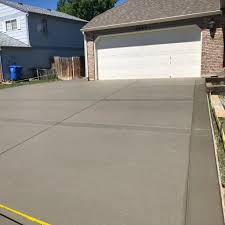 Concrete driveway in Middle Tennessee — clean broom finish with control joints
