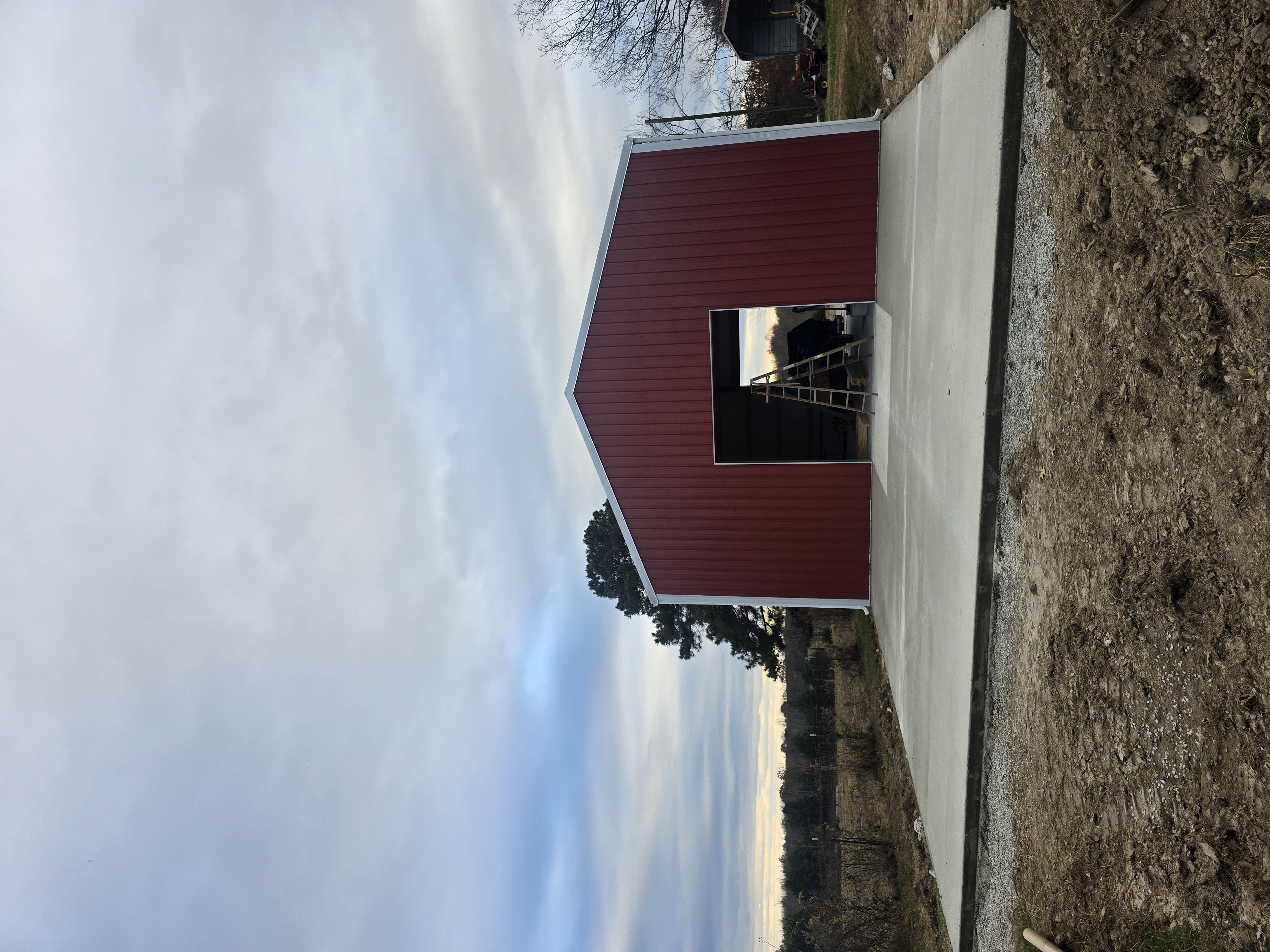 Concrete slab poured inside completed pole barn in Middle Tennessee